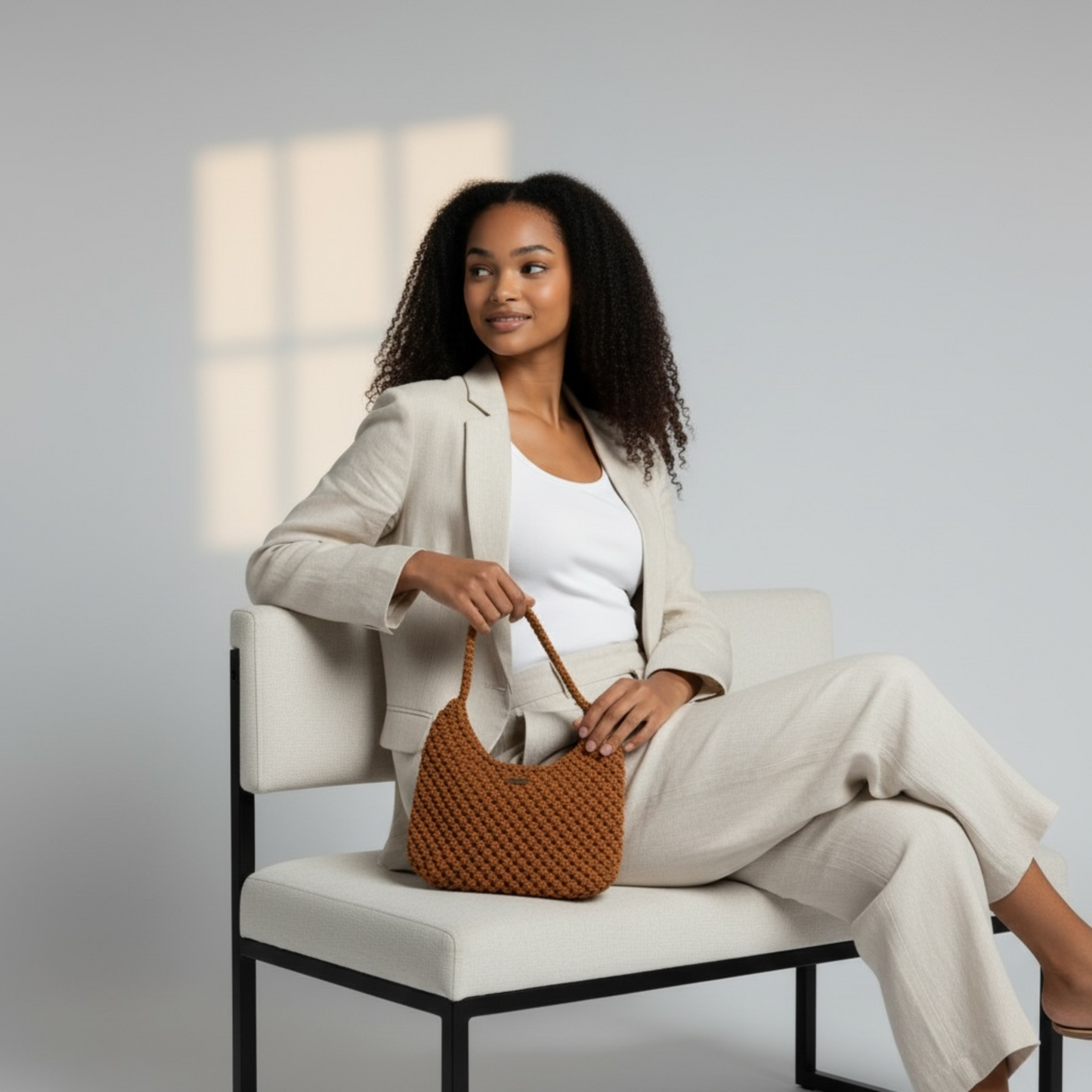 Burnt orange handmade bag styled in lifestyle setting, warm tone accessory for effortless chic outfits