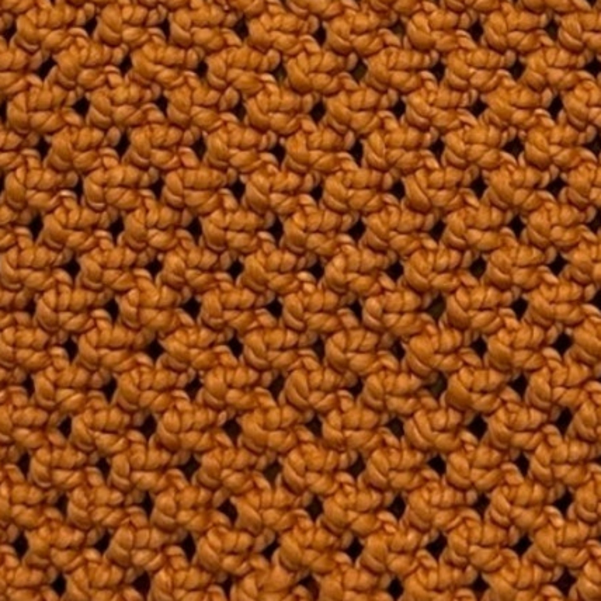 Close-up detail of burnt orange woven macrame texture, premium handcrafted stitching and structure