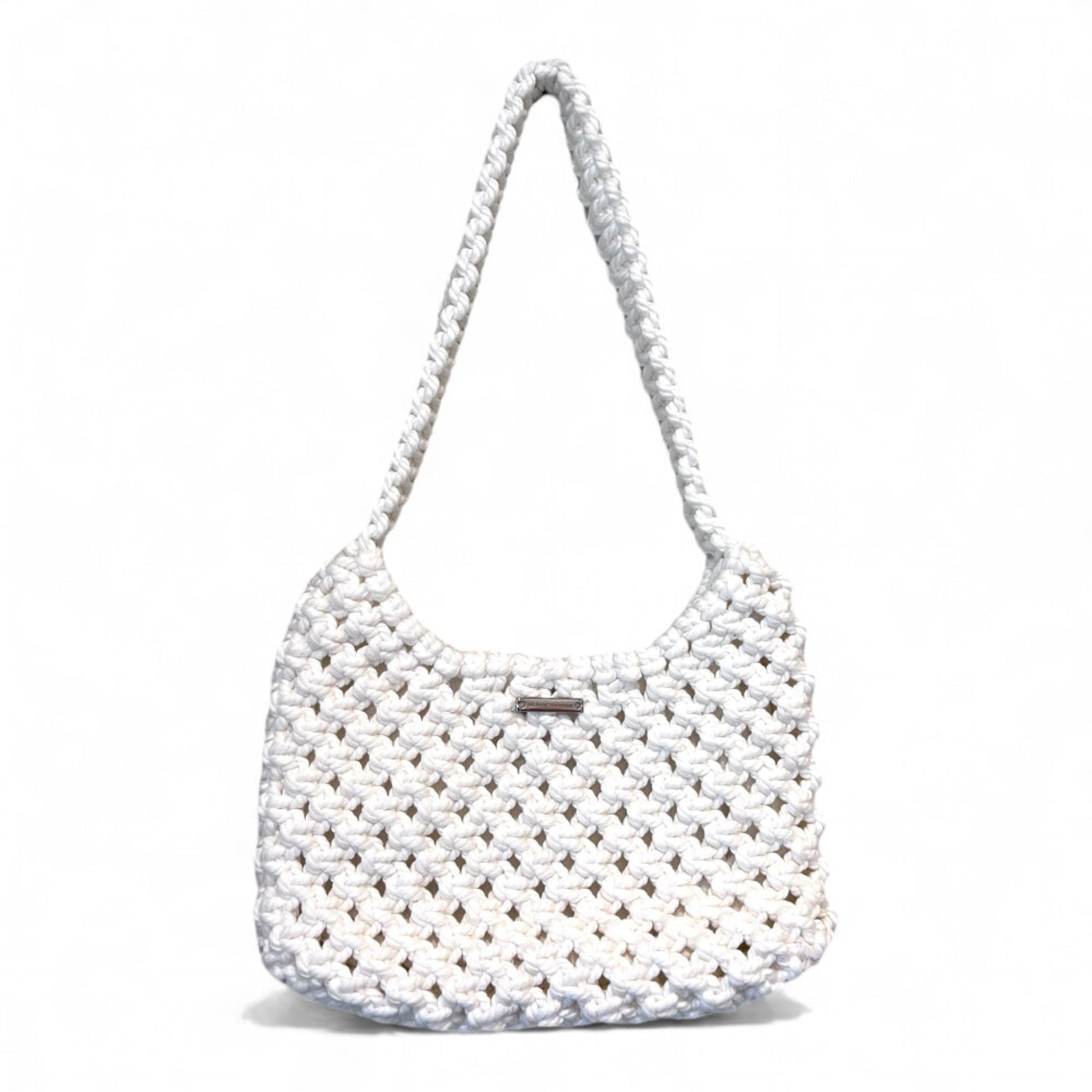 Ivory white macrame shoulder bag with handwoven texture on clean background