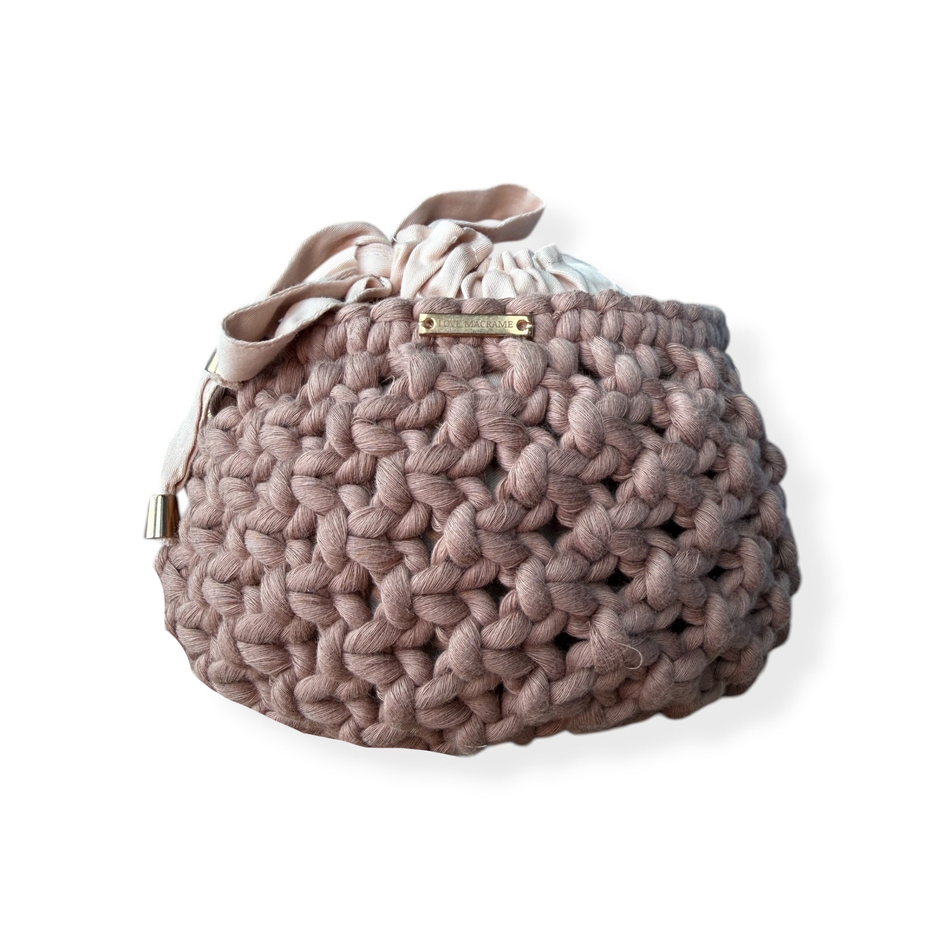 soft taupei bucket bag with gold beaded handle, luxury handcrafted handbag, neutral chic style