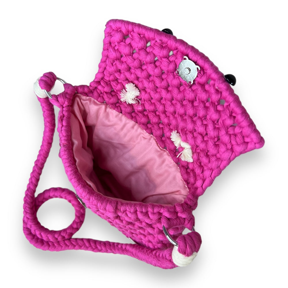 Open fuchsia Berry Bear crossbody bag showing its pink cotton-satin lining, magnetic closure and handmade interior finish.